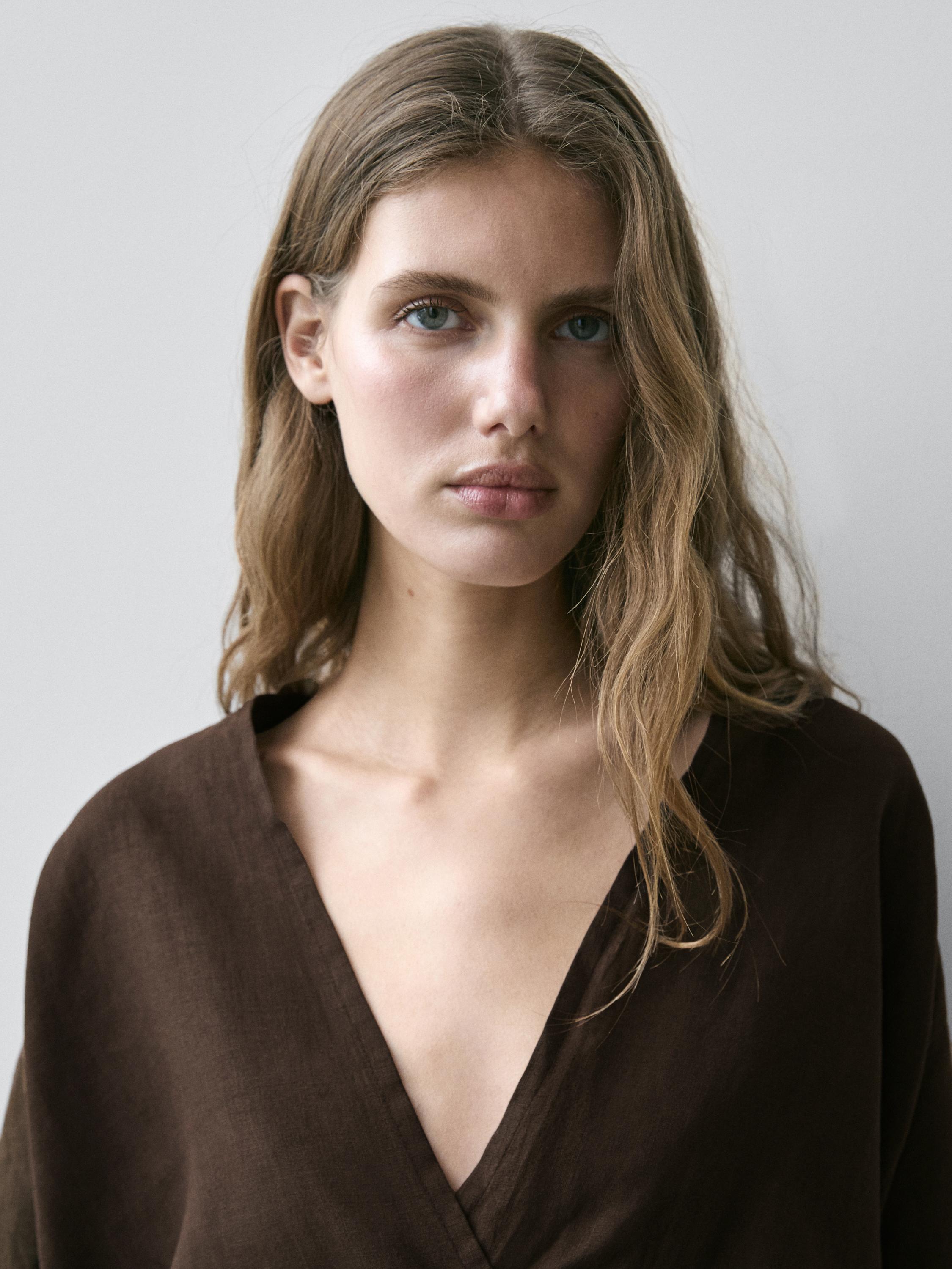 Flowing loose-fitting linen wrap blouse
